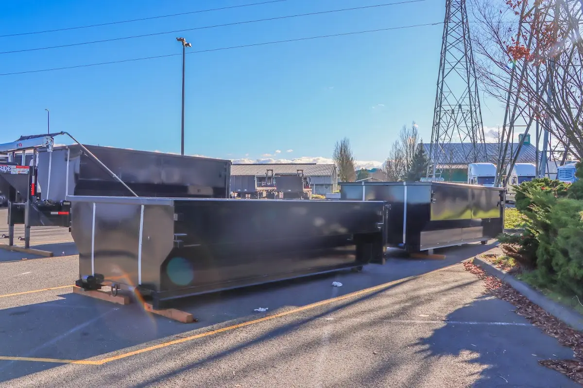 Roll-off dumpster ready for waste disposal at job site for Concrete Dumpster Rental in Middleborough